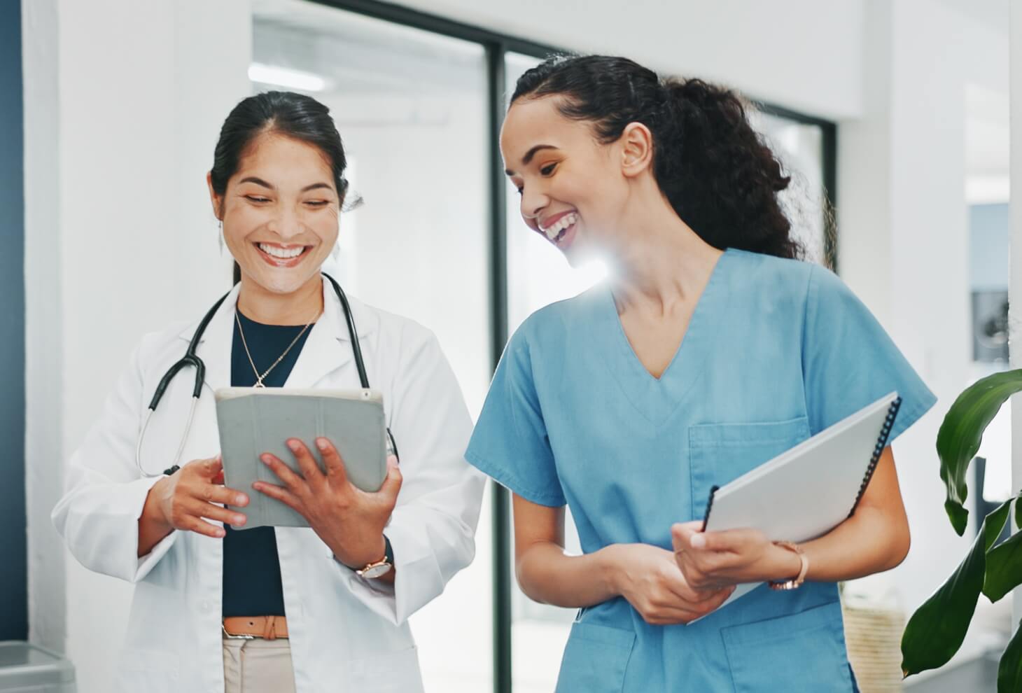 Nurses smiling and talking