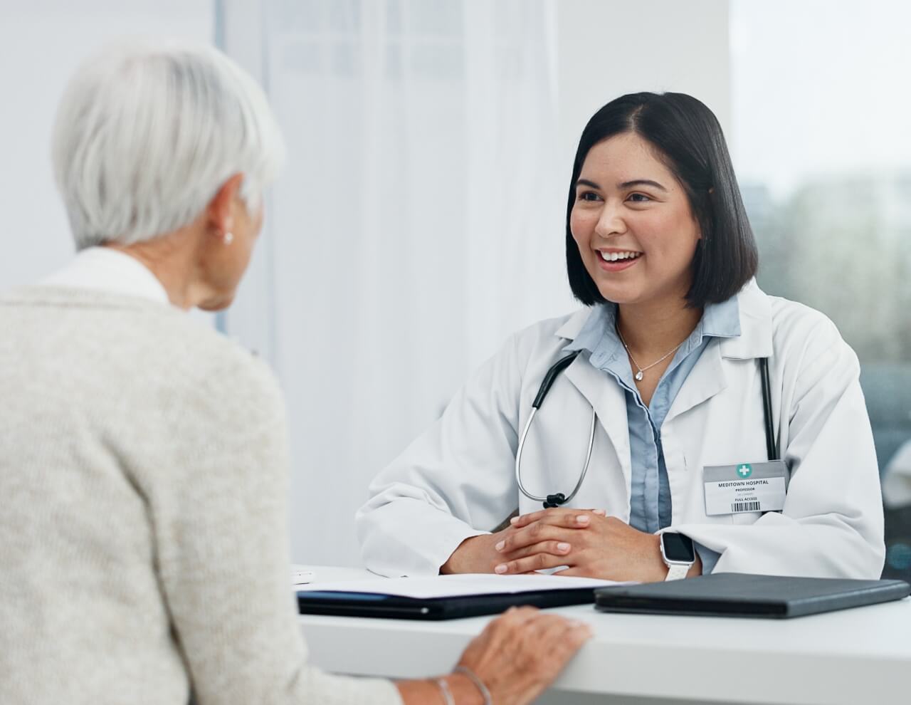 A doctor talking to a patient
